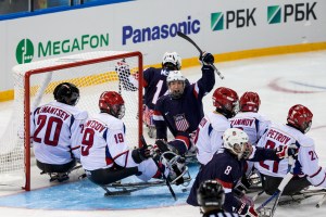 Photo by Ken King Adam Page #20 scoring a  nice goal off a rebound