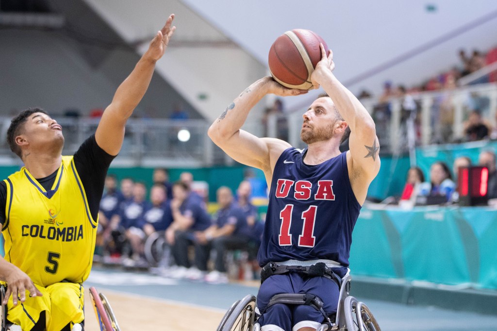 Steven Serio attempts a shot over Colombia's Joymar Granados in Saturday's gold medal game.