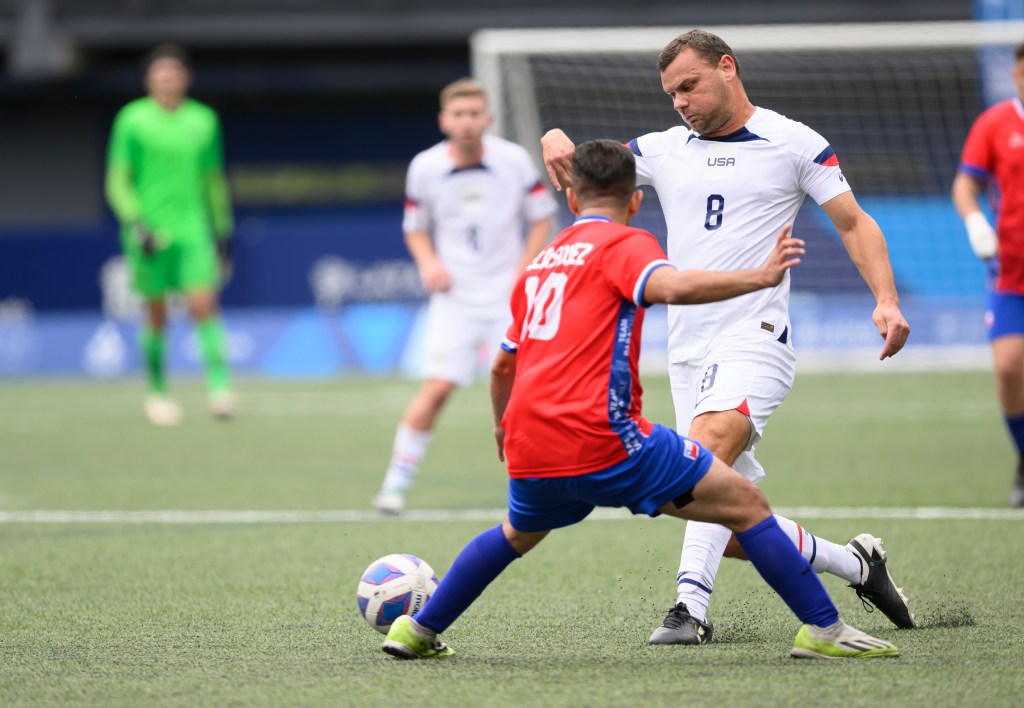 Andrew Bremer dribbles past Bastian Velasquez in Team USA's dominant effort over Chile.