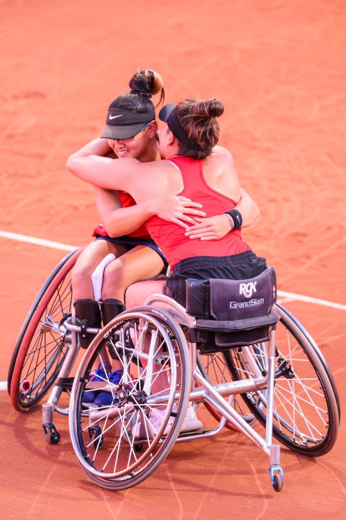 Mathewson and Phelps hug after their victory was secured.